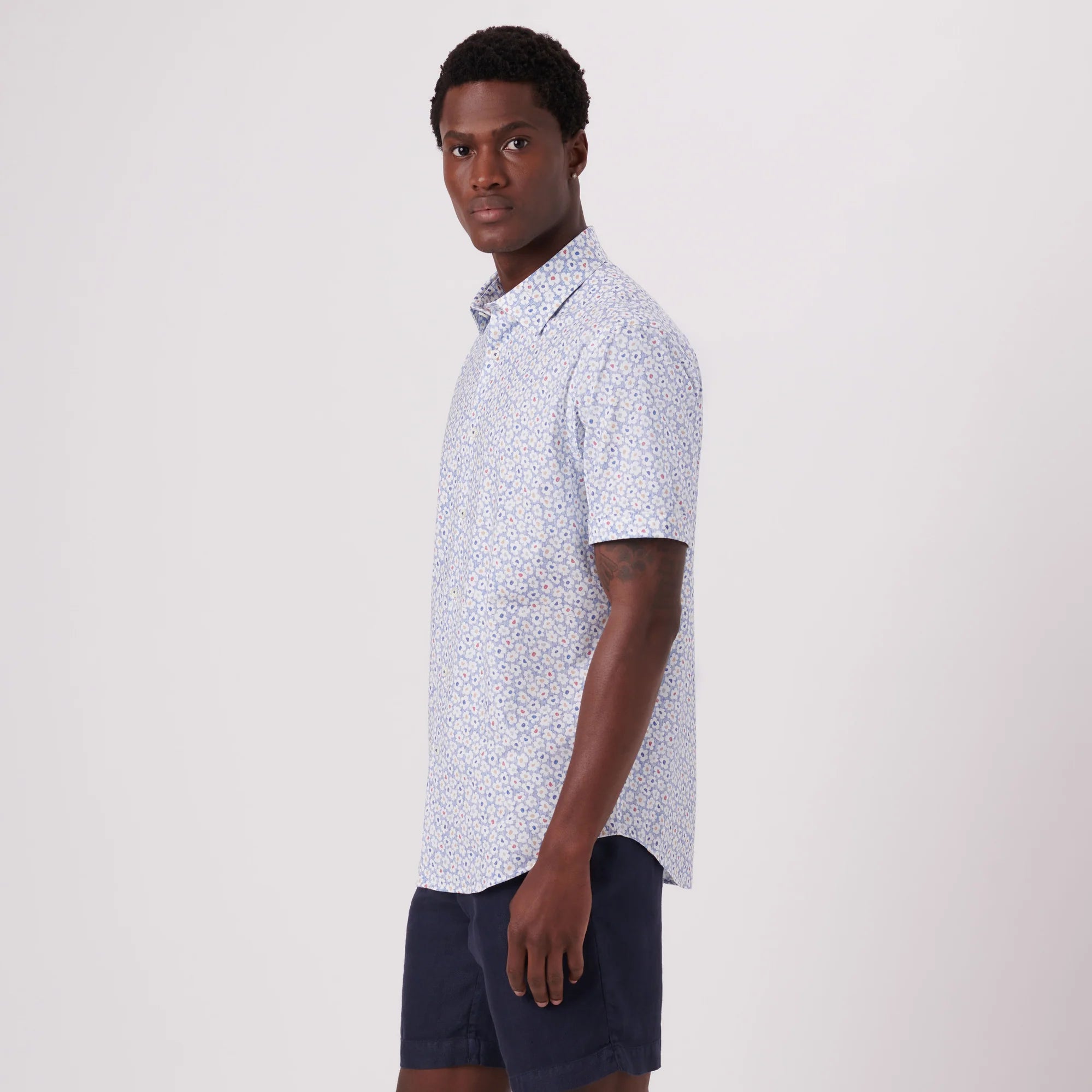 Black shirt blue shorts 2025